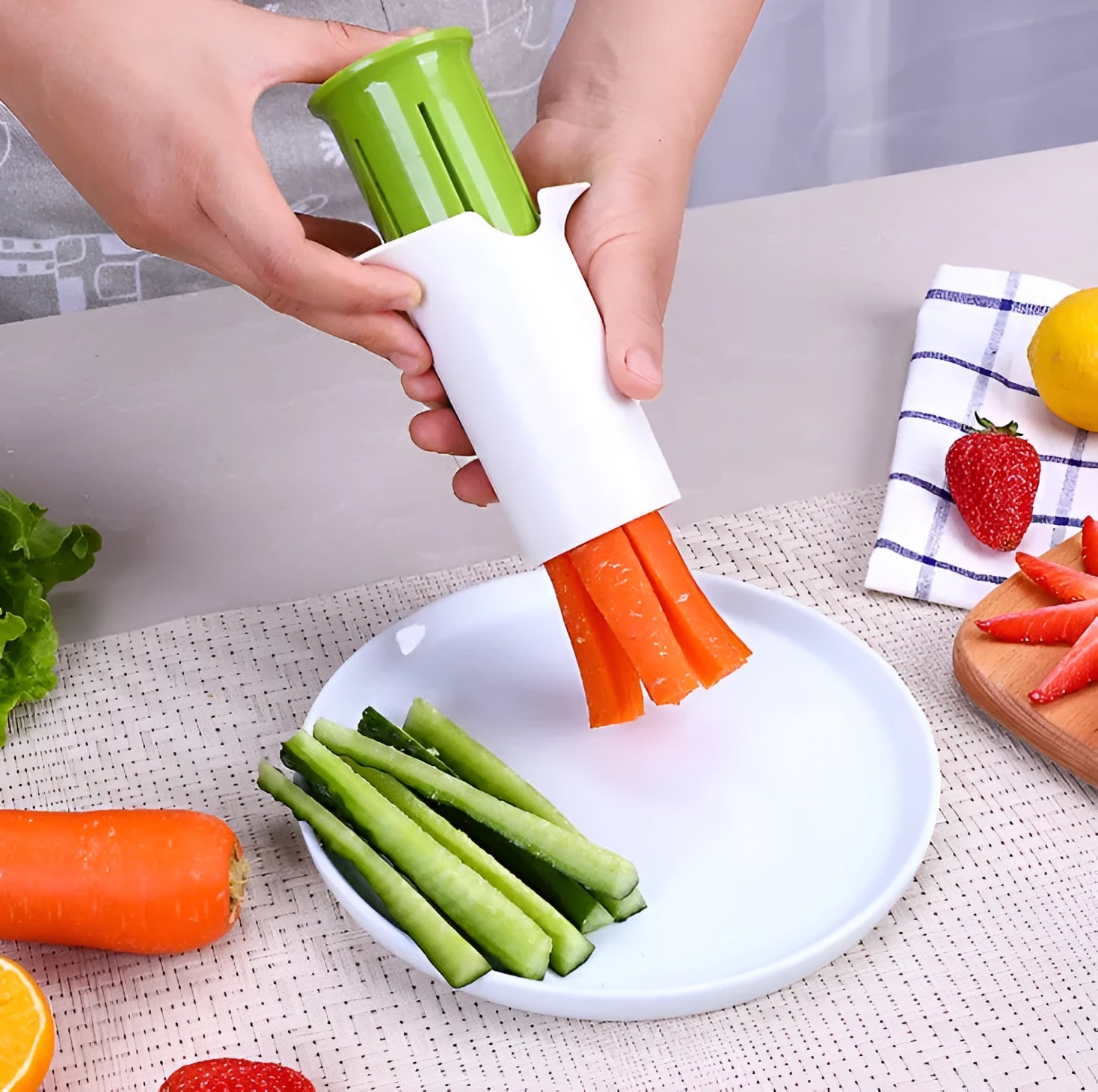 White ABS plastic vegetable slicer with stainless steel blades for cucumbers, carrots, and strawberries