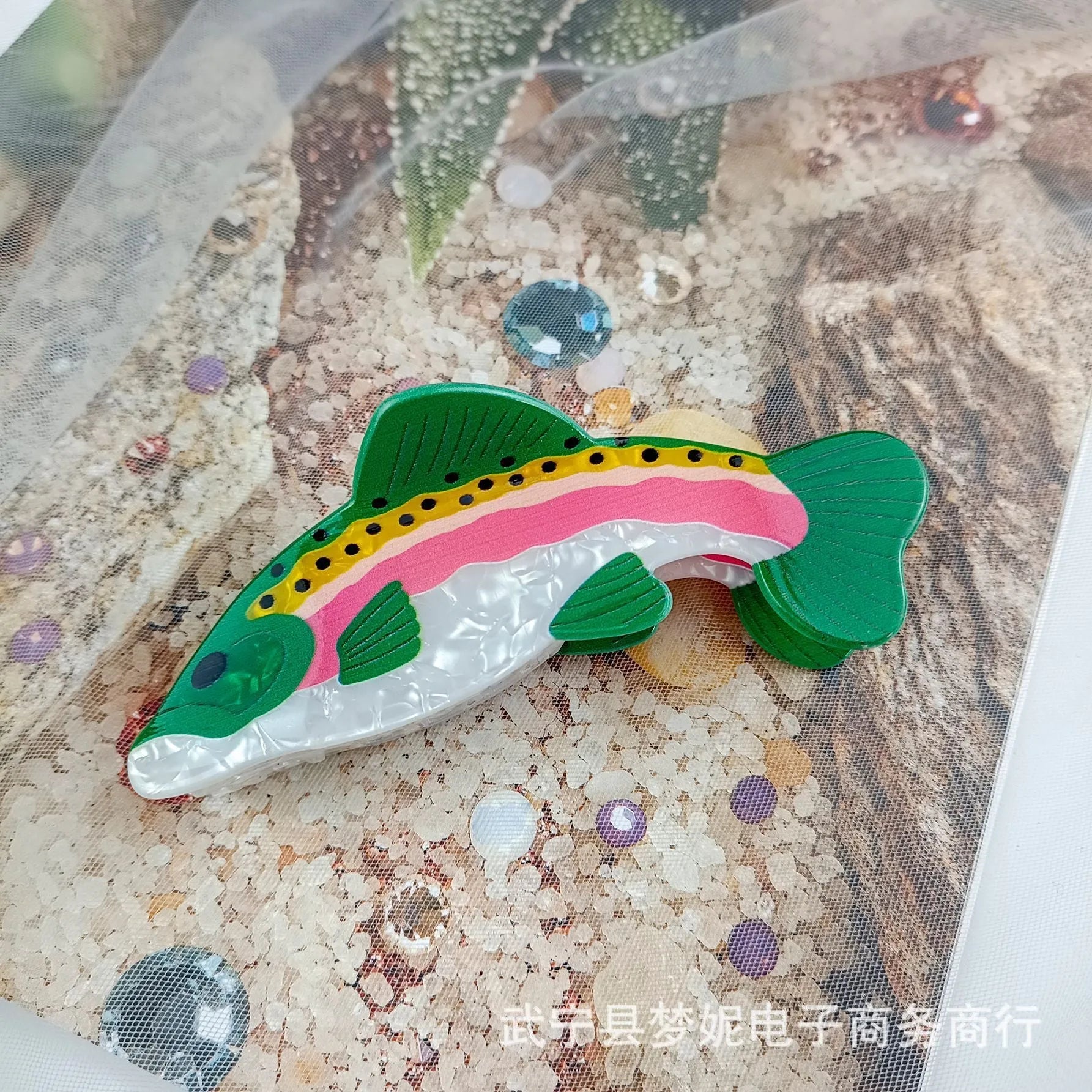 Dark green PVC hair clip with printed rainbow trout marine design