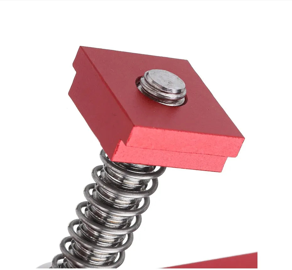Red-handled aluminium alloy woodworking table block slide holder with a flat mouth shape.