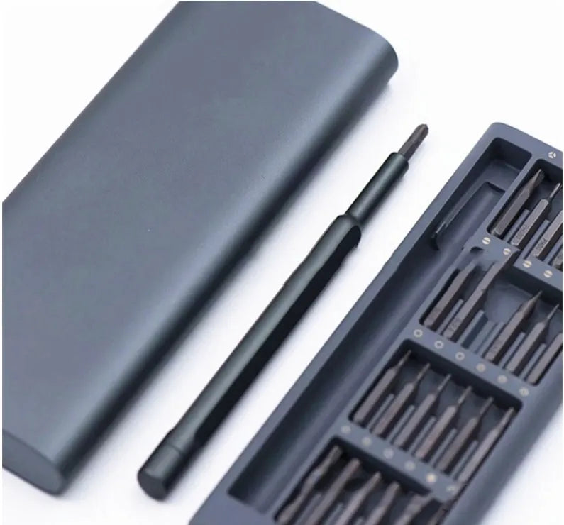 24 in 1 grey aluminium alloy screwdriver set with S2 steel bits on a workbench