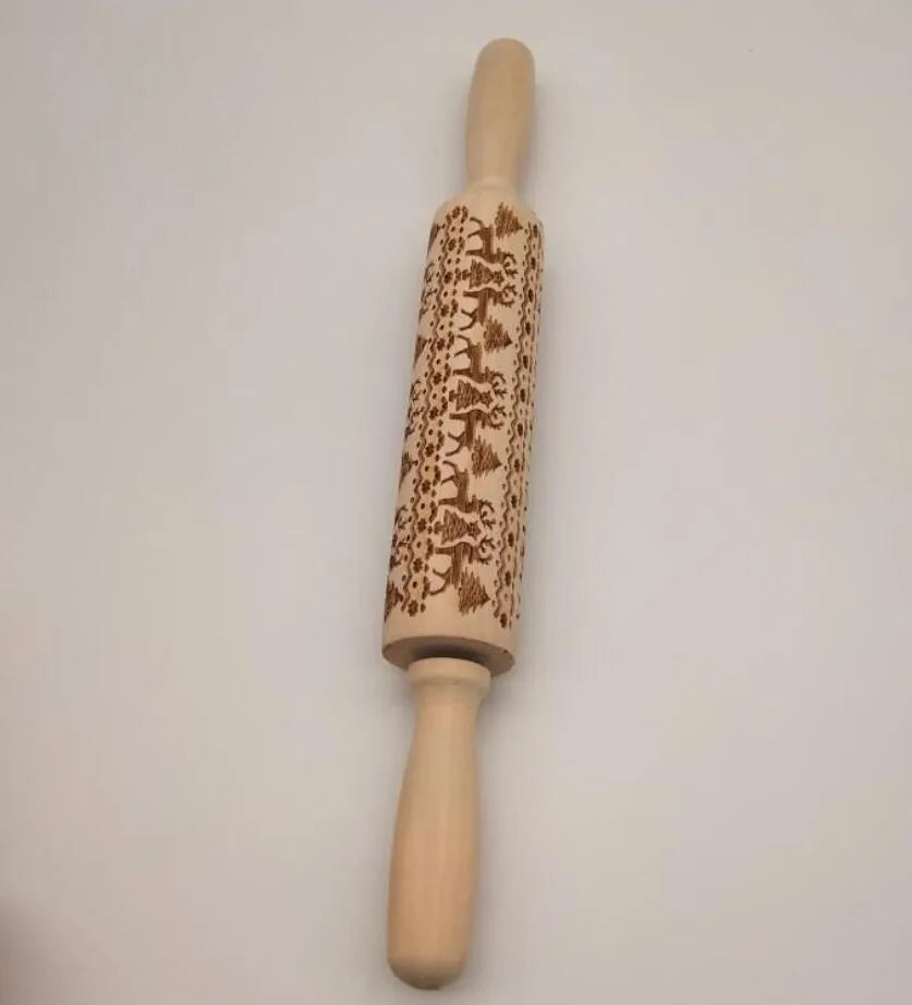 45cm long wooden rolling pin with embossed Christmas patterns like reindeer and snowflakes for baking.