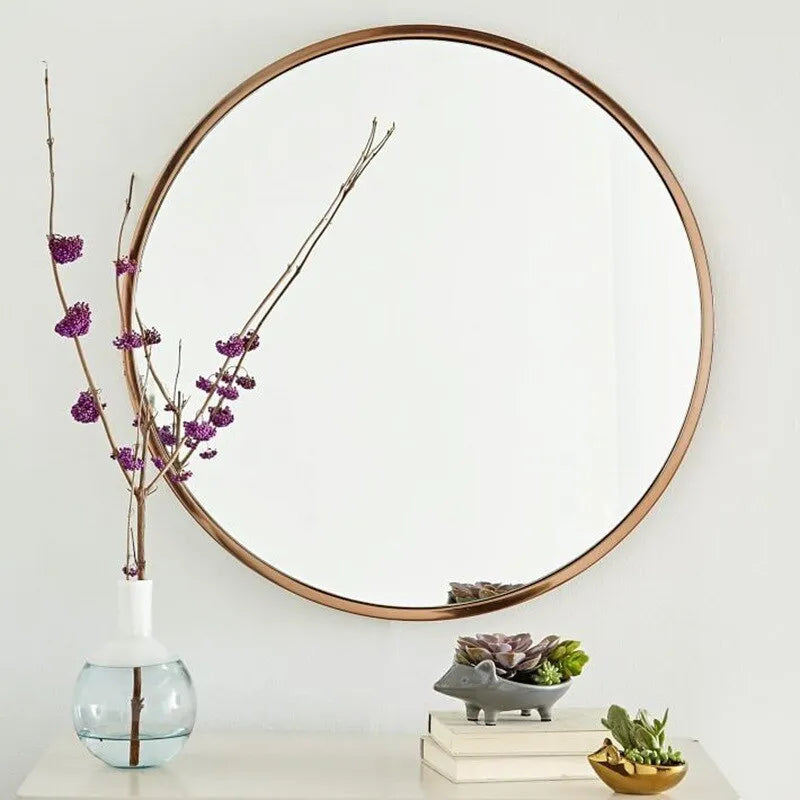 Round Nordic style bathroom wall mirror with iron frame in black, white, or gold colour, 30cm diameter.