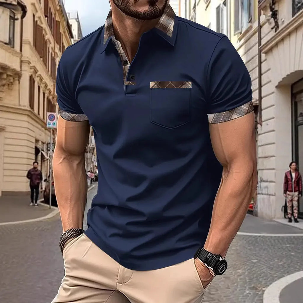Man wearing a loose-fit plaid colourblock short sleeve t-shirt in a summer setting.