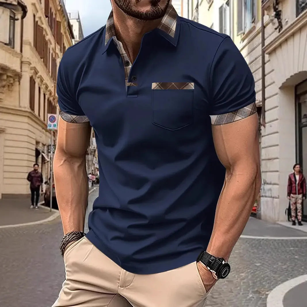 Man wearing a loose-fit plaid colourblock short sleeve t-shirt in a summer setting.