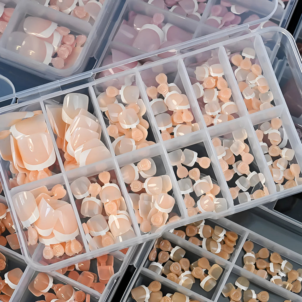 120 piece box of French white edge nude full square short press-on nails in nine colour shades