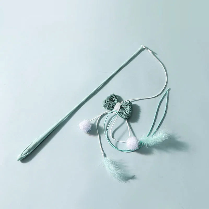 Blue long pole cat teaser toy with feather attachments and an inflated ego design element.