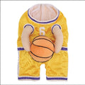 Red dog wearing a basketball costume with a small attached basketball