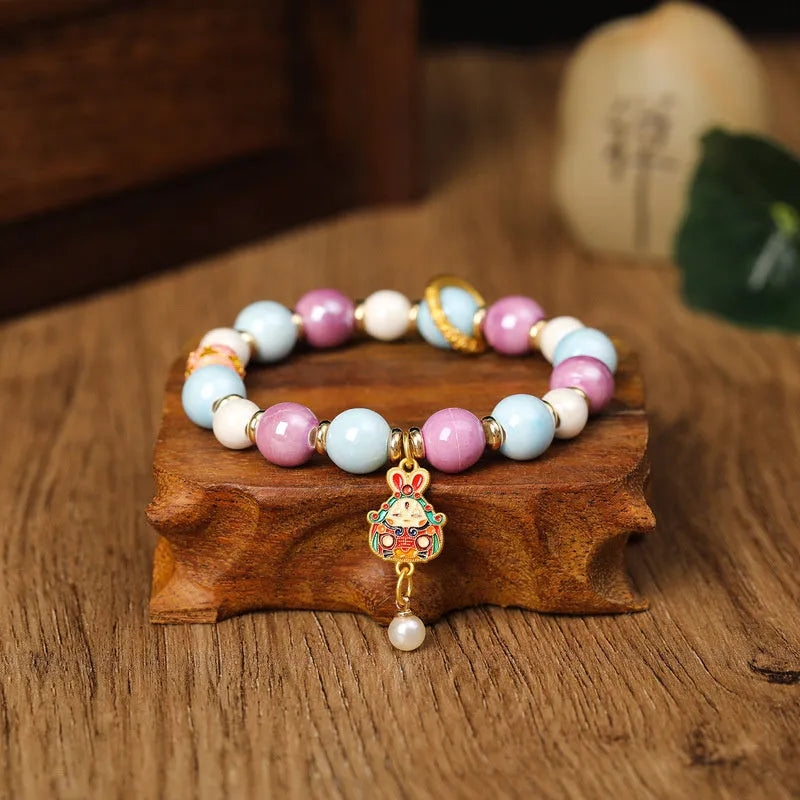 Lucky Rabbit ceramic bracelet with grey porcelain glazed charm on adjustable cotton string