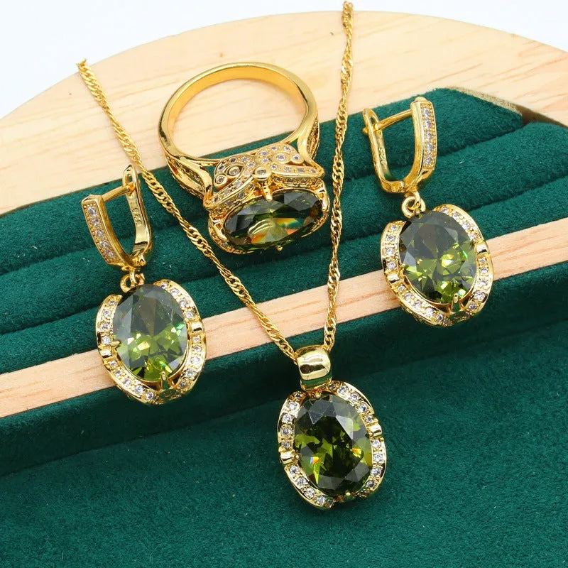 Women's rhinestone zircon jewellery set with cross, crown, and Roman numeral designs on a snake bones chain.