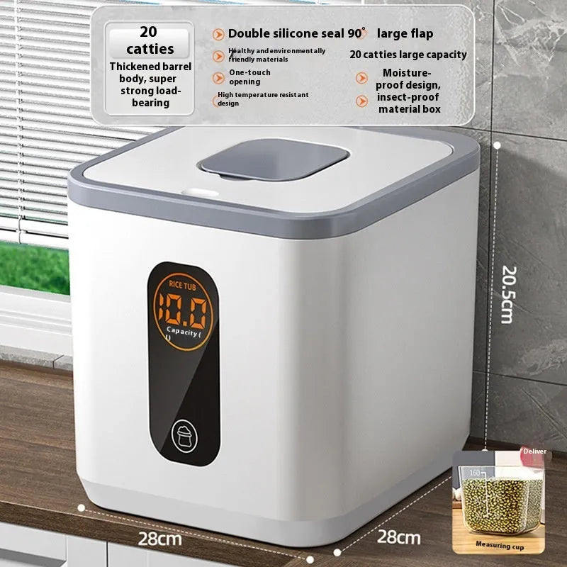 Simple grey plastic rice storage jar with lid and measuring cup for sealed, insect-proof food storage.