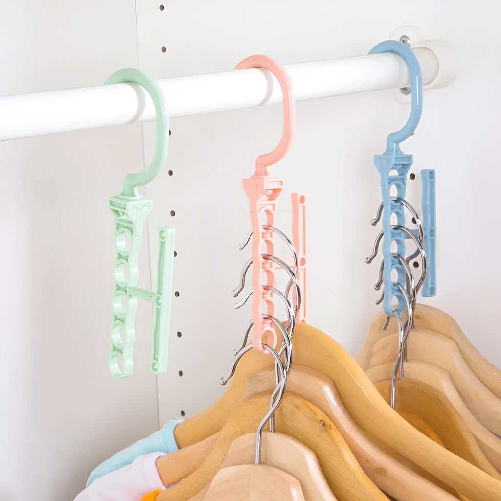 Blue revolving wardrobe hanger with five holes and handle for organising multiple garments