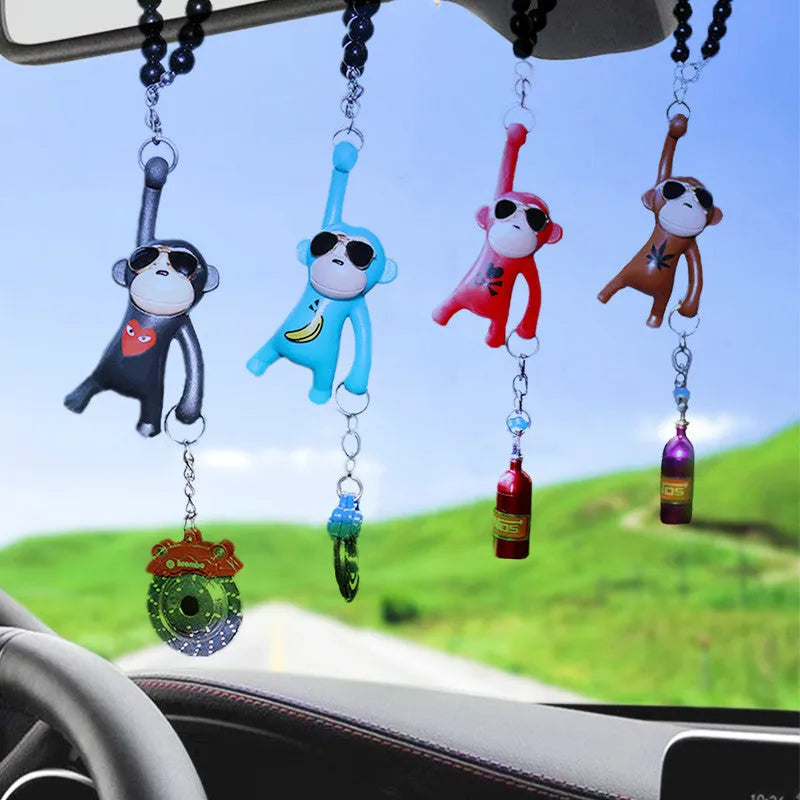 Cartoon monkey wearing sunglasses rearview mirror pendant on a bead necklace.