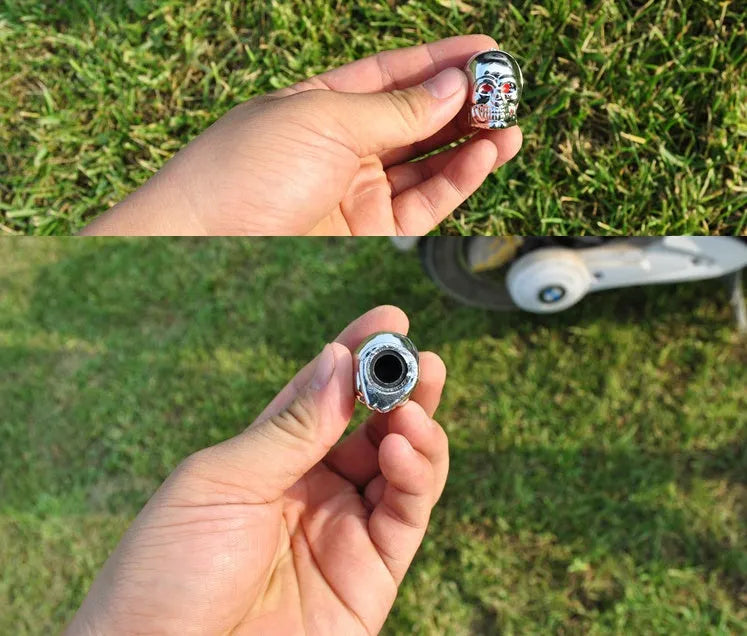 Black rubber tubeless car valve cover on a tyre valve stem
