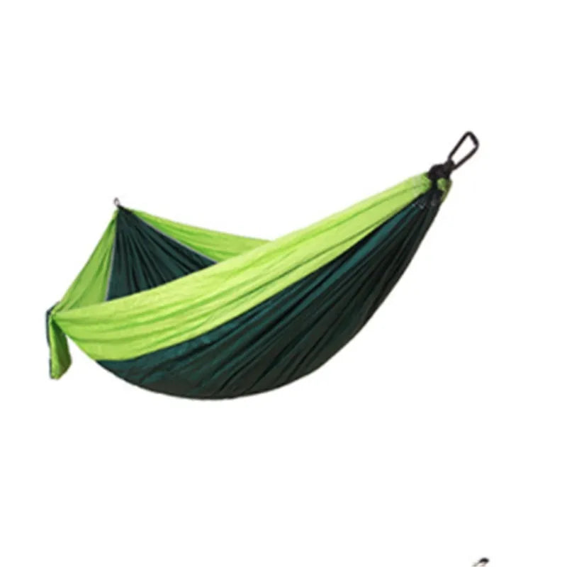 Double widened camping hammock 275x140cm in 210T nylon parachute fabric with steel buckles and ropes, shown outdoors in a garden setting