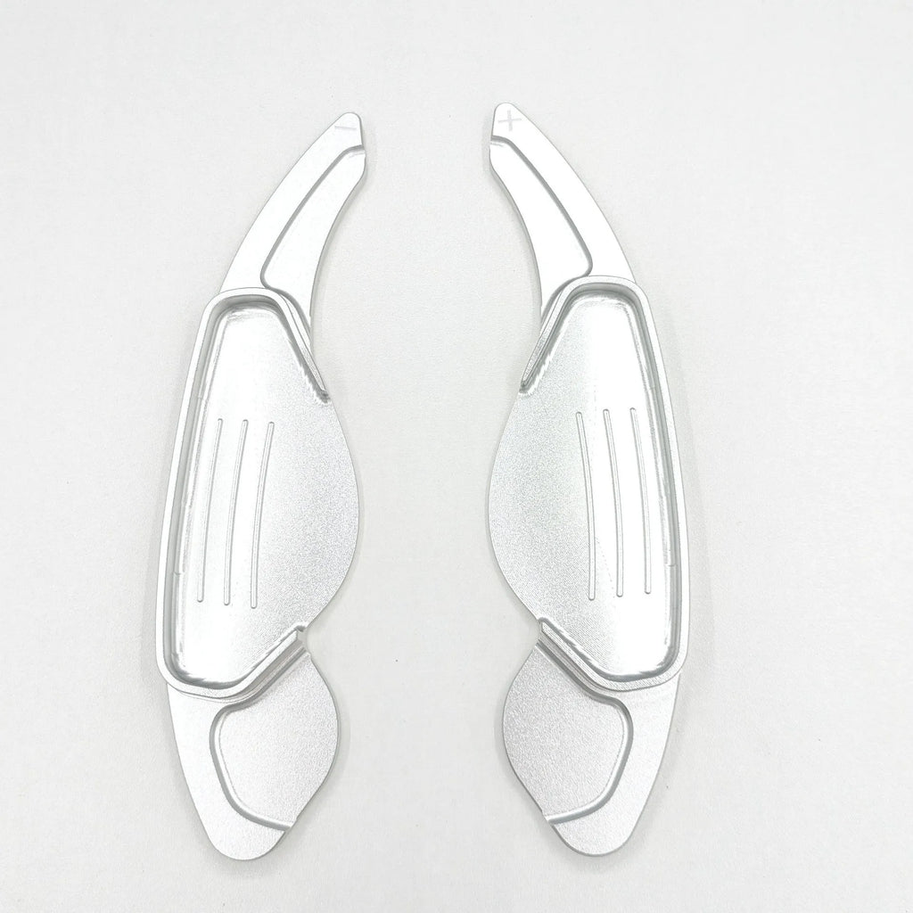 Aluminium alloy steering wheel shift paddles in silver, red, blue, and black for universal car interior modification.