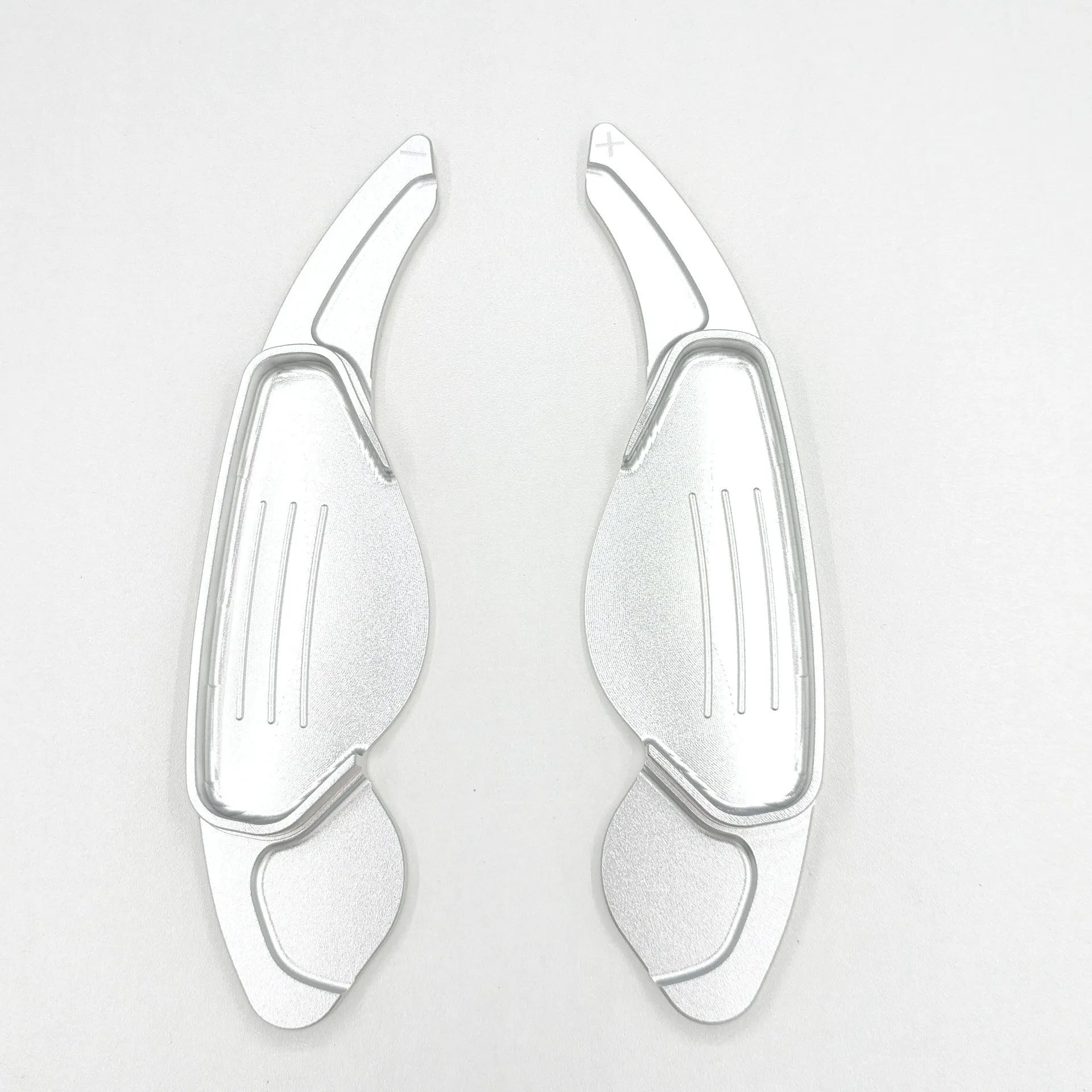 Aluminium alloy steering wheel shift paddles in silver, red, blue, and black for universal car interior modification.