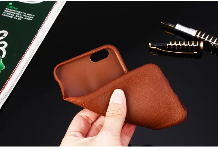 Leather and TPU iPhone case shown in black, brown, navy blue, and wine red colours for multiple Apple models.