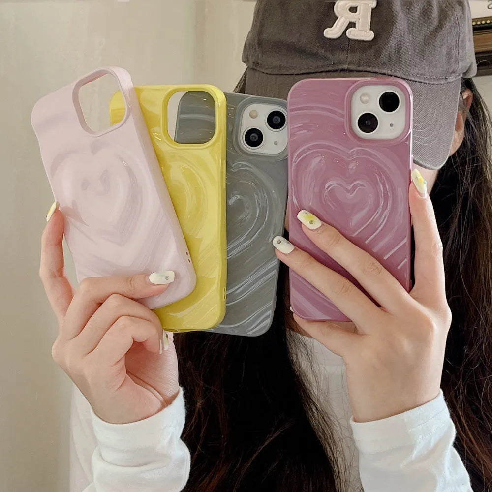 Solid colour iPhone case with raised three-dimensional love pattern in TPU material