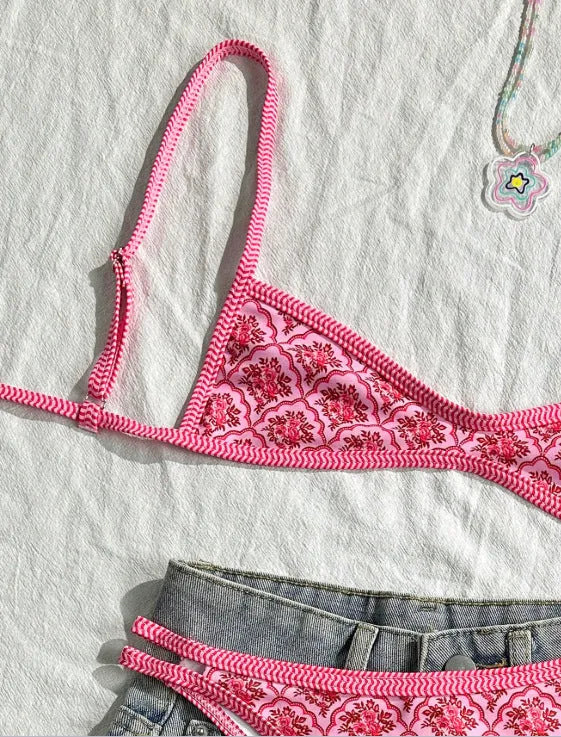 Pink printed two-piece swimsuit with shoulder straps and exposed back, top and shorts set, sizes S M L XL