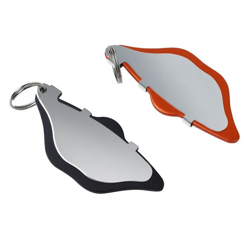 Mountain bike disc brake linings replacement pads in black and orange with adjustment flap