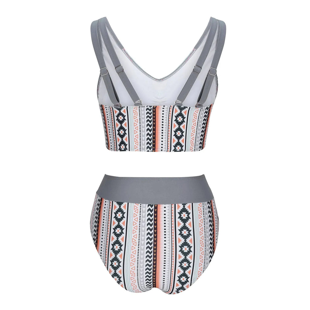 Blue women's cross sling one-piece swimsuit on a mannequin, showing the split design and back detail.
