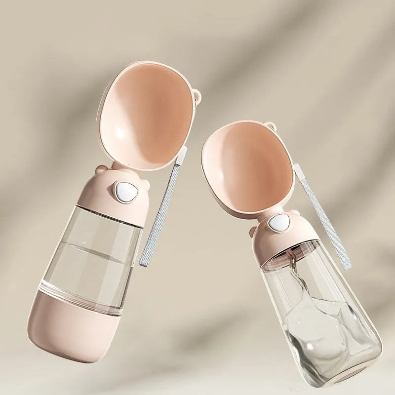 Portable dog water bottle and feeder bowl in PP plastic, shown in brown, pink, and yellow colours.