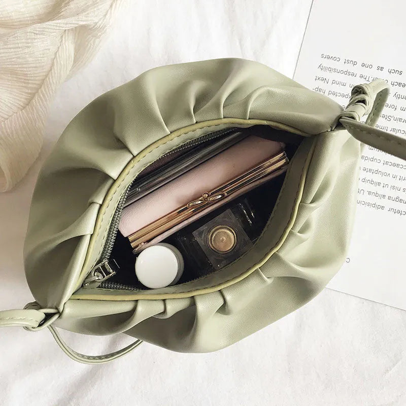 Soft PU Korean-style cloud crossbody bag with dumpling shape, pleated detail, phone pocket, and six colour options