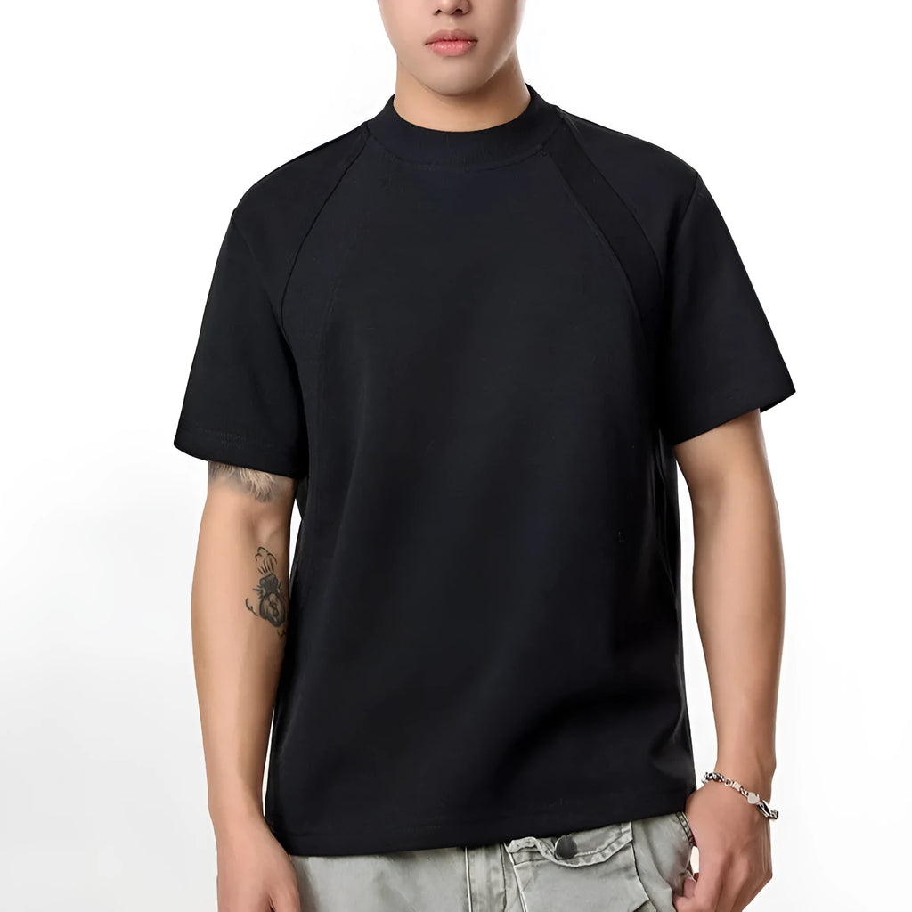 Loose fit short sleeve top with textured air layer stitching on polyester fabric.