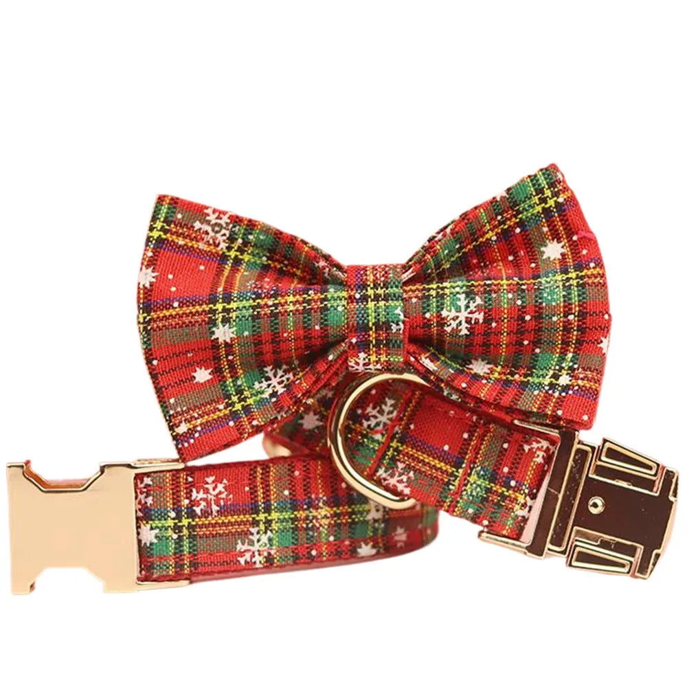Red Christmas dog collar and leash set with snowflake design, plaid rope, floral bows, and matching vest