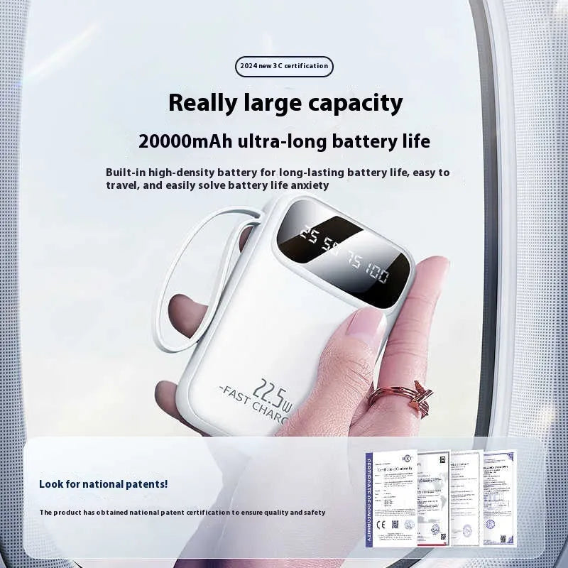 Moon White portable power bank 20000mAh 22.5W with screen and built-in cable on table