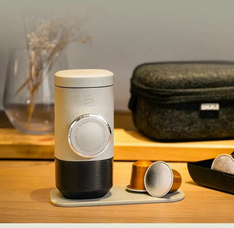 Manual espresso portable capsule coffee machine in olive gray with built-in cup and storage bag