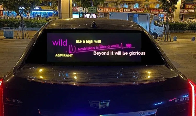 Long rectangular car rhythm lamp with electroluminescent panel showing colourful music-reactive light patterns