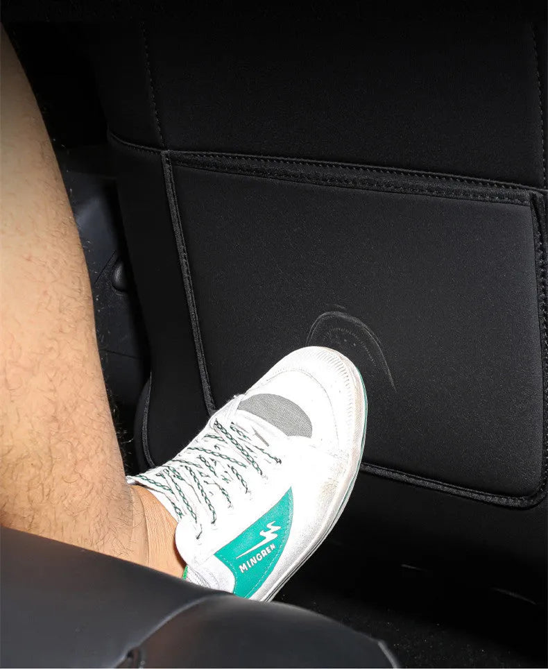 Black leather rear anti kick pads for car seat protection measuring 68cm by 42cm