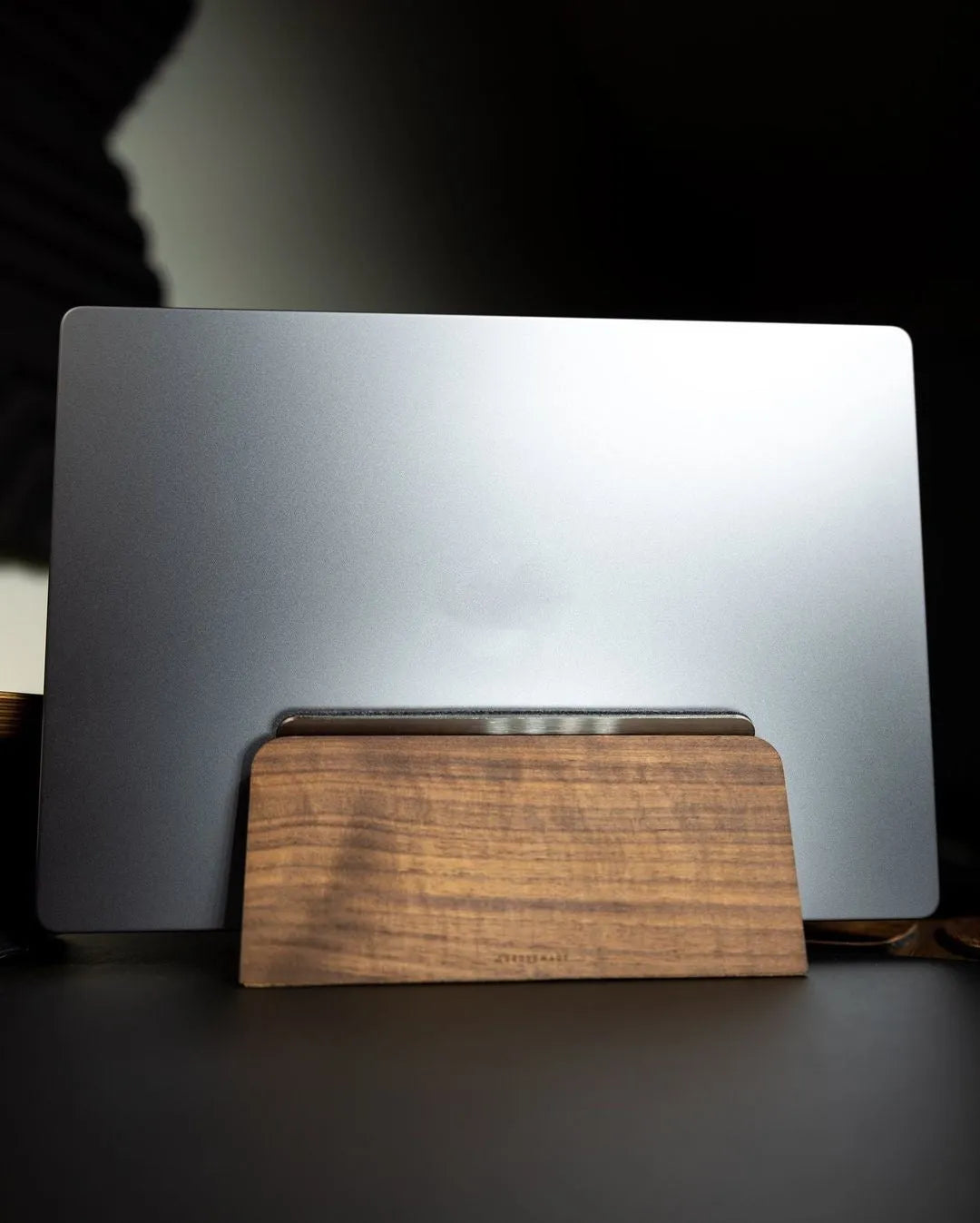 Walnut solid wood laptop stand on desk with universal fit and compact size
