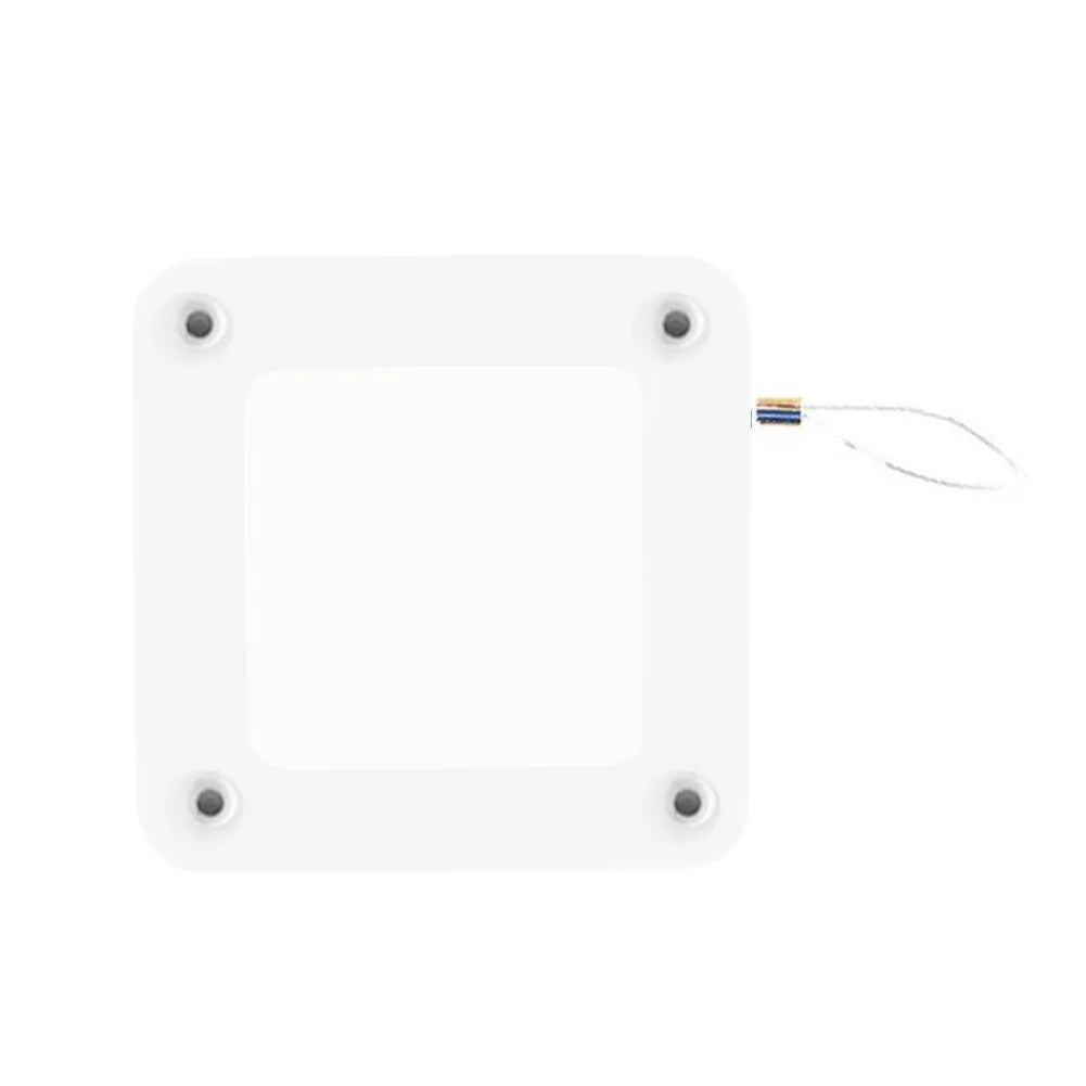 Automatic door closer with adhesive backing and transparent hook for punch-free installation on a door.