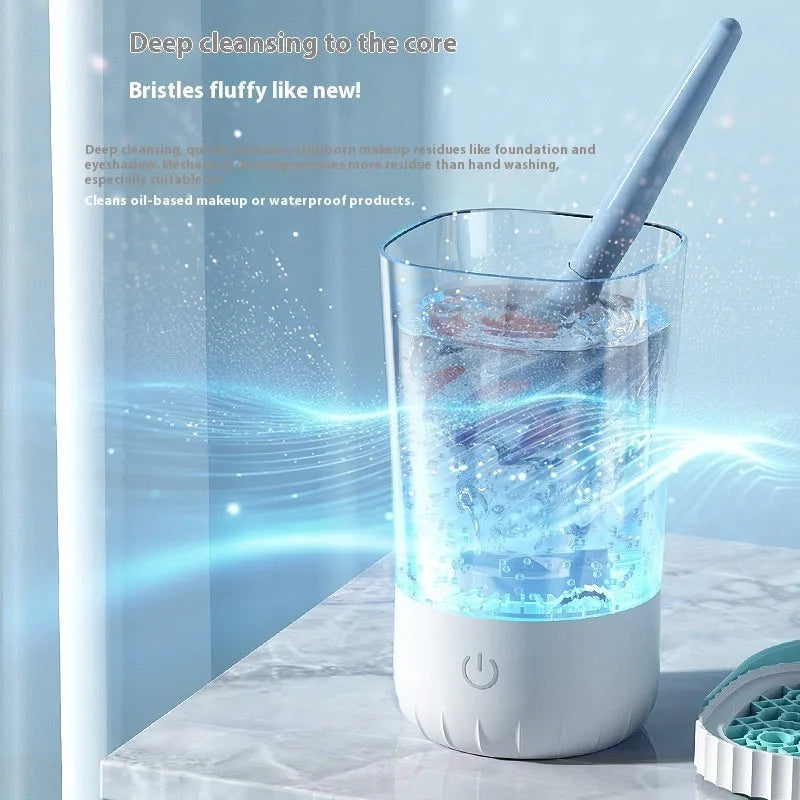 White rechargeable electric makeup brush cleaner with USB cable measuring 24x10x11cm