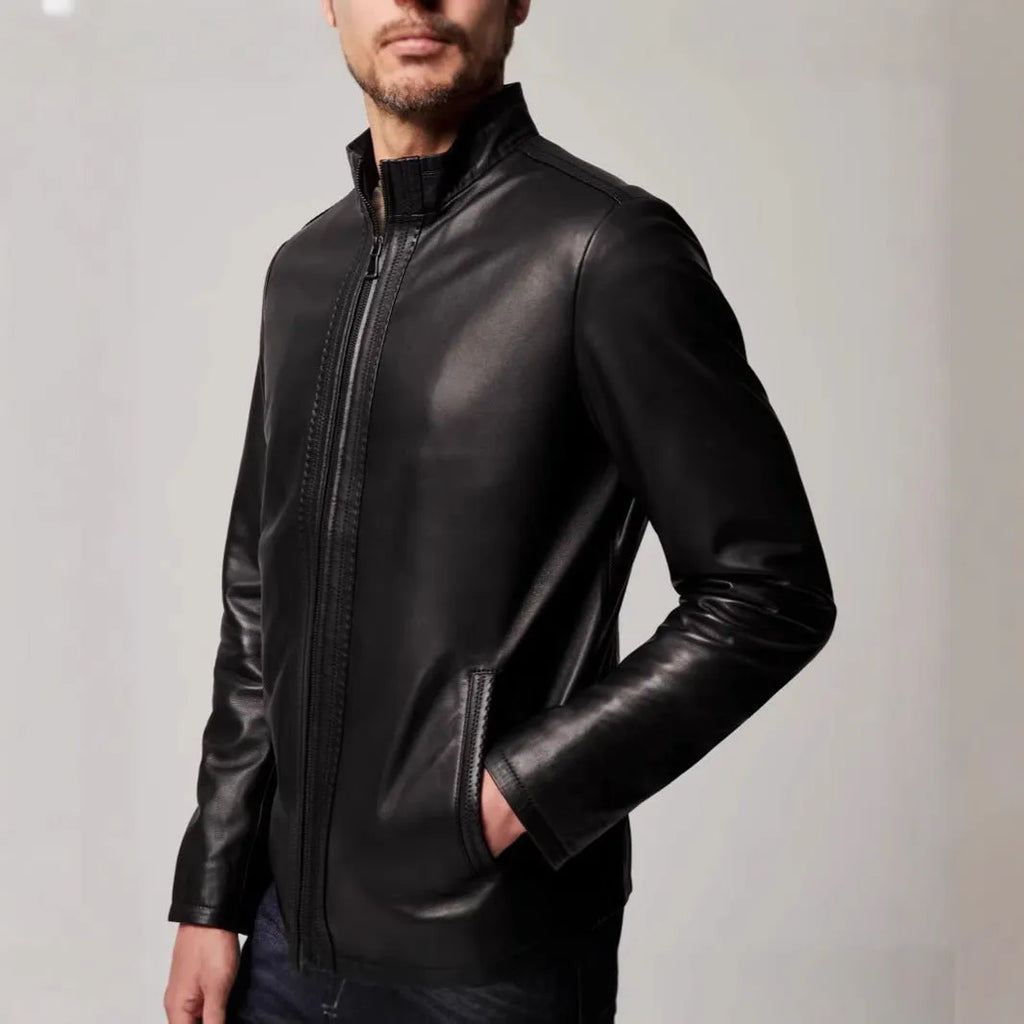 Man wearing a black retro-style leather-look jacket made from polyester fibre.