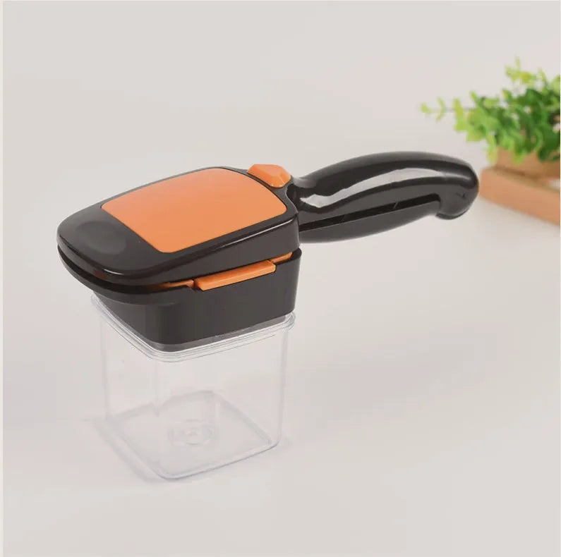 Multifunctional pressing vegetable cutter in green with push-action handle on white background