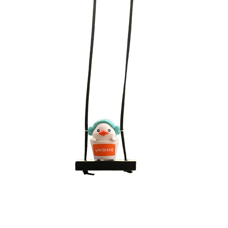 Yellow plastic cartoon duck doll car hanging ornament with a choice of bath towel, swimming ring, bath bucket, or bow pendant.