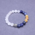 Natural stone agate mixed colour elastic bracelet unisex with black agate and tigereye beads on white background