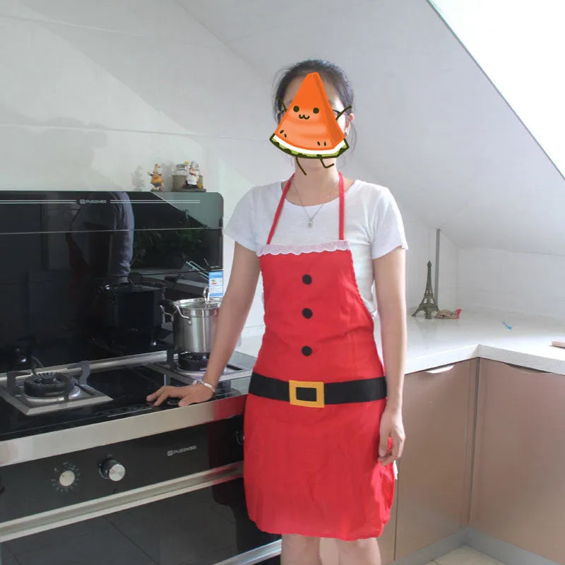 Red Christmas-themed kitchen apron shown in adult and children's sizes