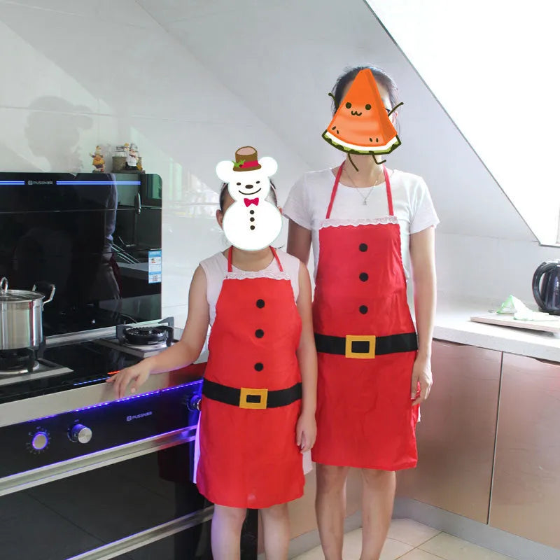 Red Christmas-themed kitchen apron shown in adult and children's sizes