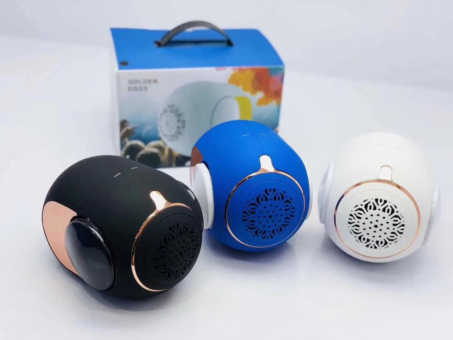 Small golden egg shaped wireless Bluetooth speaker in black white or blue colour