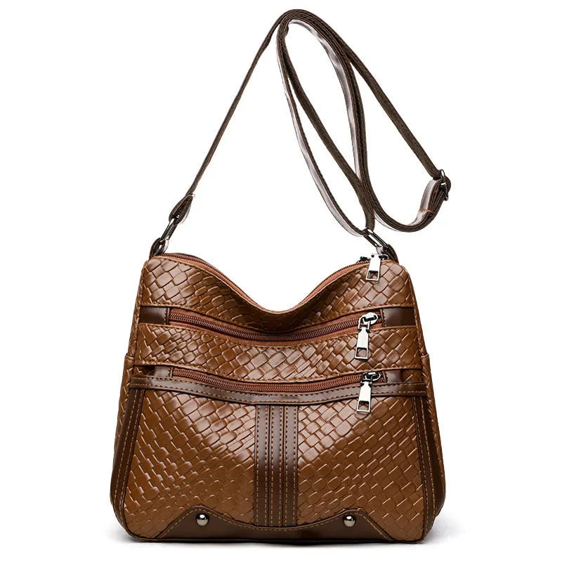 Brown woven PU messenger bag with single shoulder strap, showing multi-compartment interior with zippered change purse