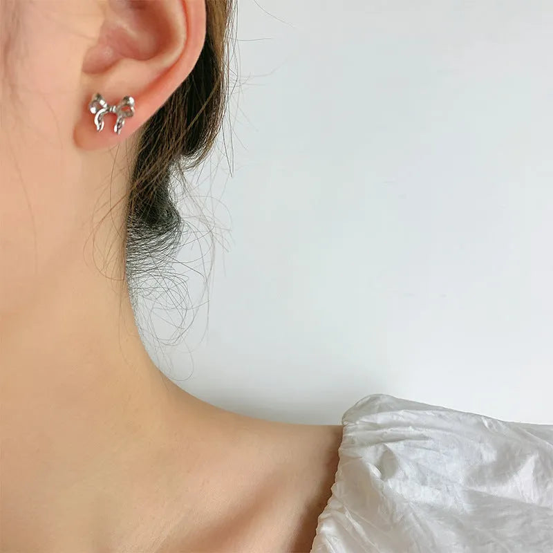 Silver bow earrings for women, copper electroplated, single ear clip and bow ear buckle single, cold wind style
