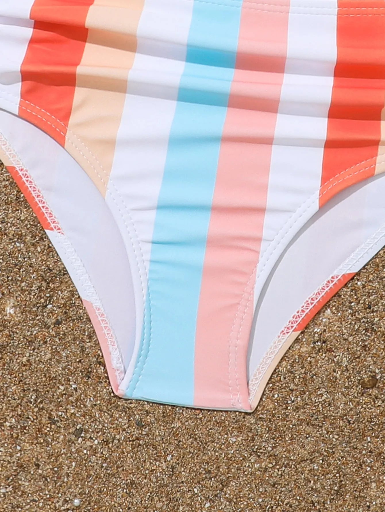 Girls' plaid print two-piece swimsuit set with bra top and briefs for swimming.
