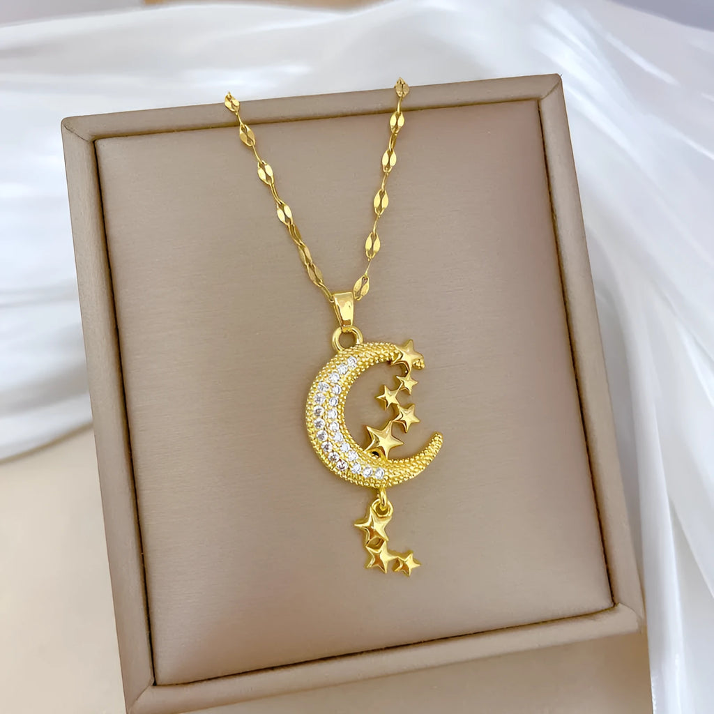 Stainless steel necklace with a copper moon pendant featuring a full diamond pattern design.