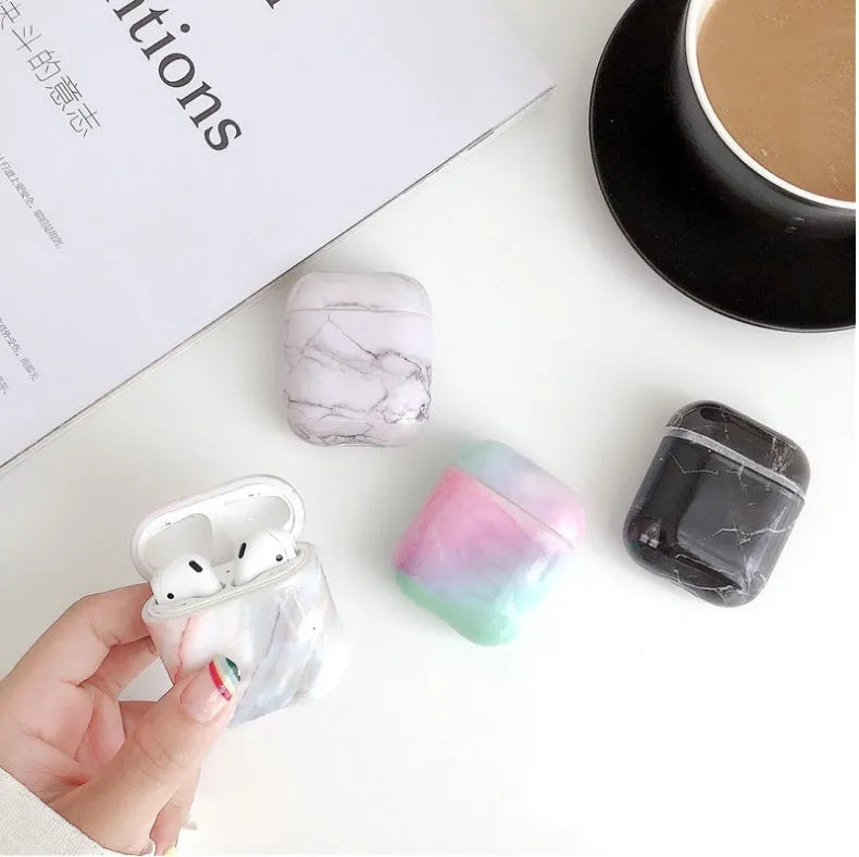 White marble pattern hard protective case for AirPods 1 and 2 wireless headphones charging box.