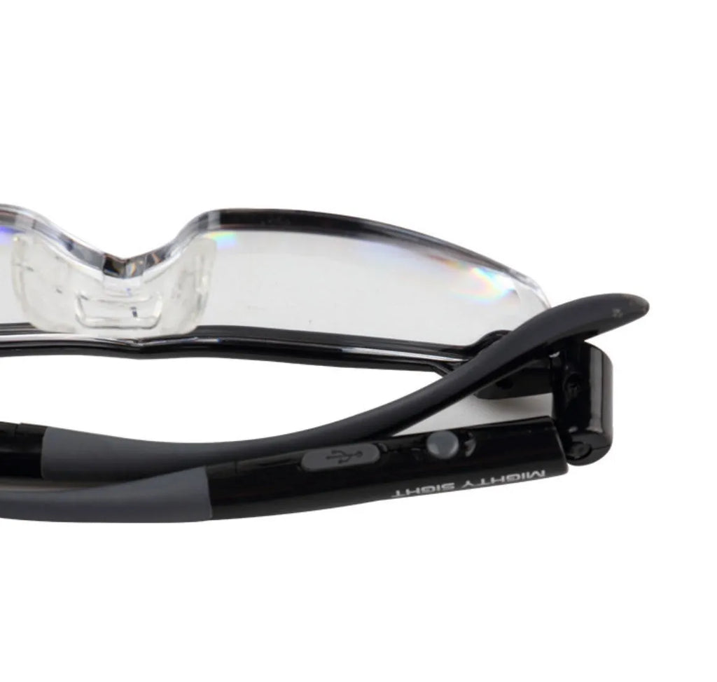 Transparent black USB LED reading glasses with integrated lighting and ABS frames