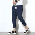 Summer men's loose fit casual trousers in cotton hemp blend with drawstring waist tapered legs nine-tenths length